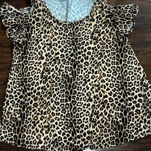 Love this cheetah shirt! I have a Medium and a Large!